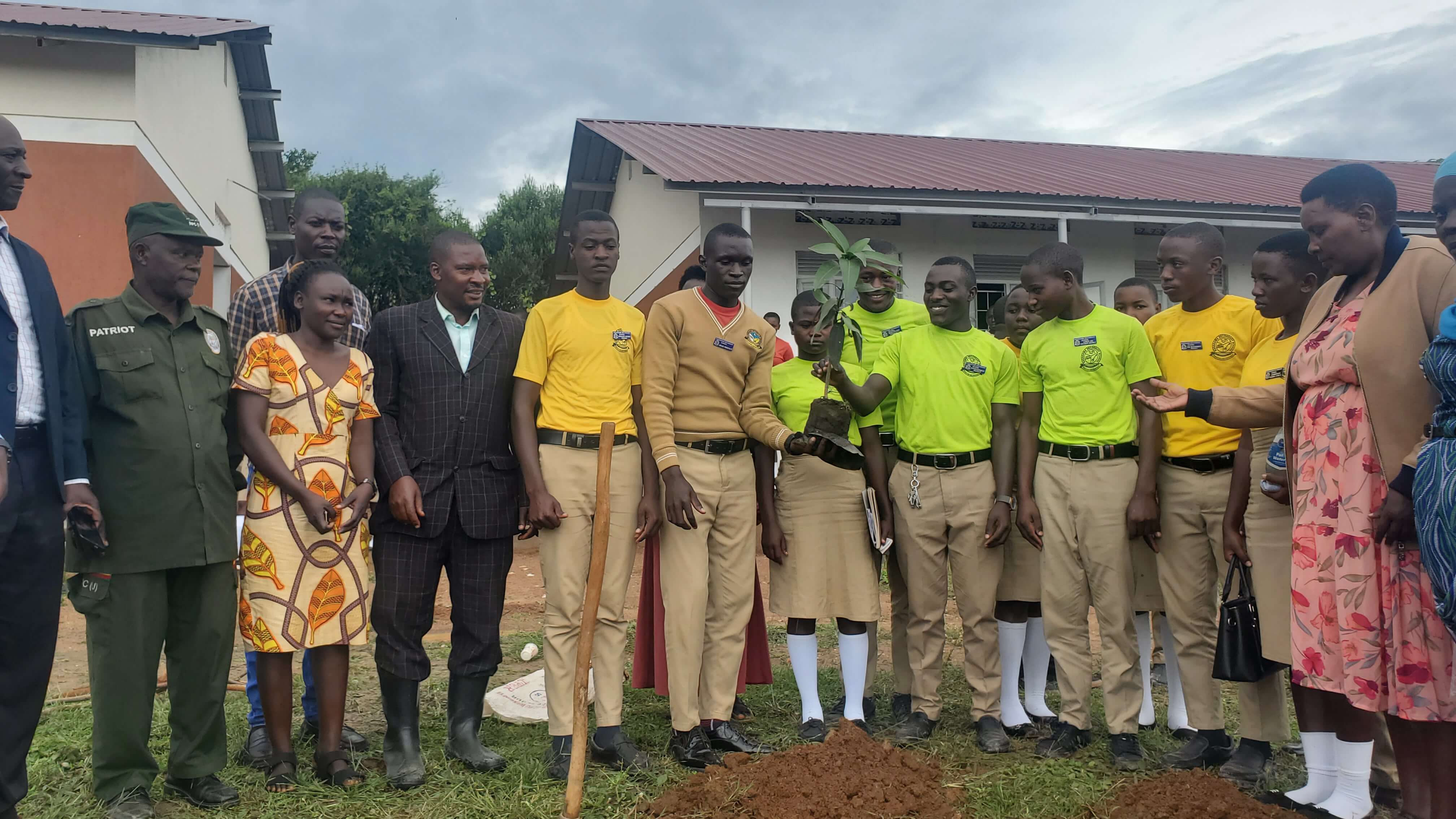 Kasagama Secondary School students planting trees in the school compound.