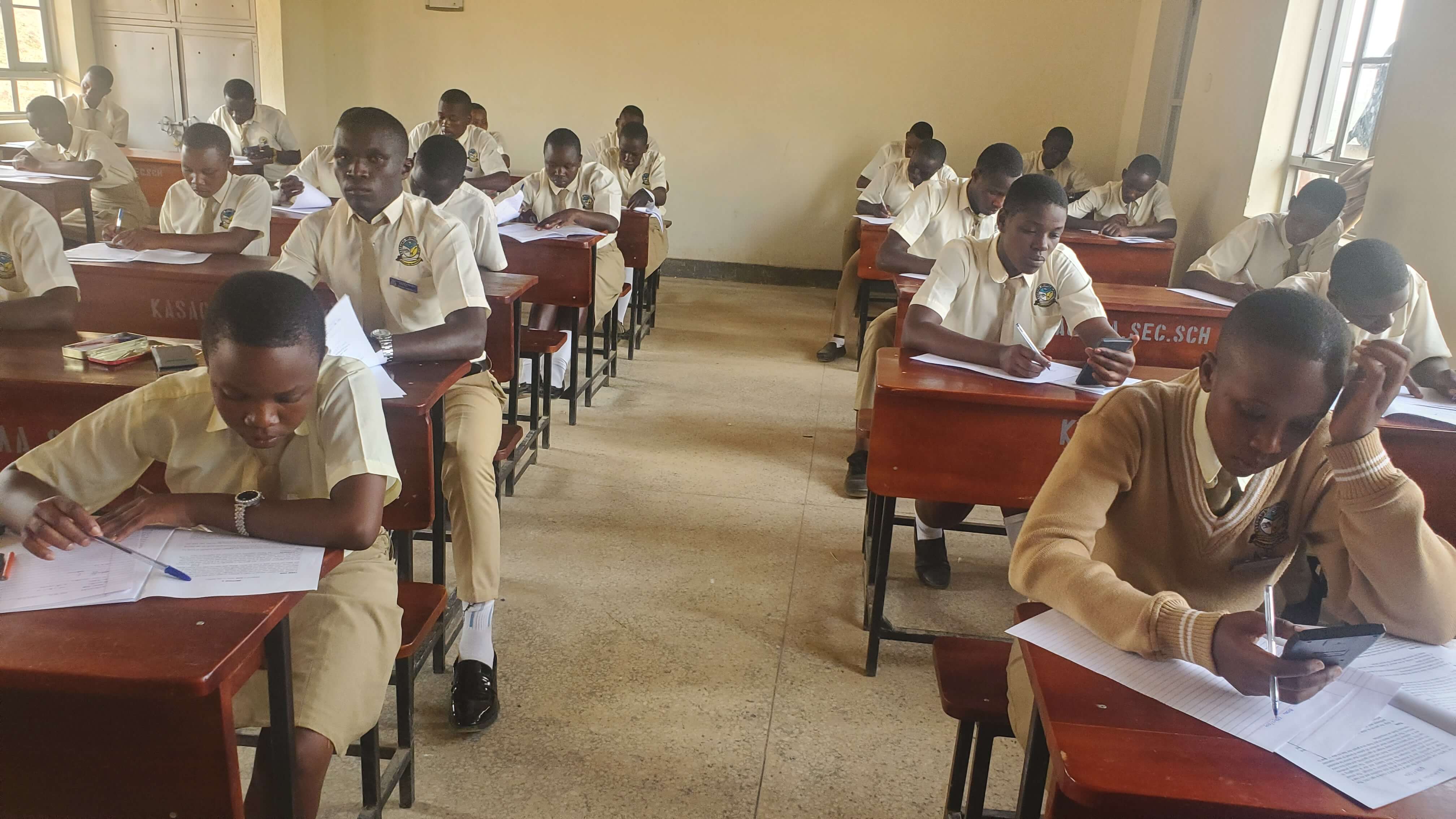 Kasagama Secondary School Students in examination hall.